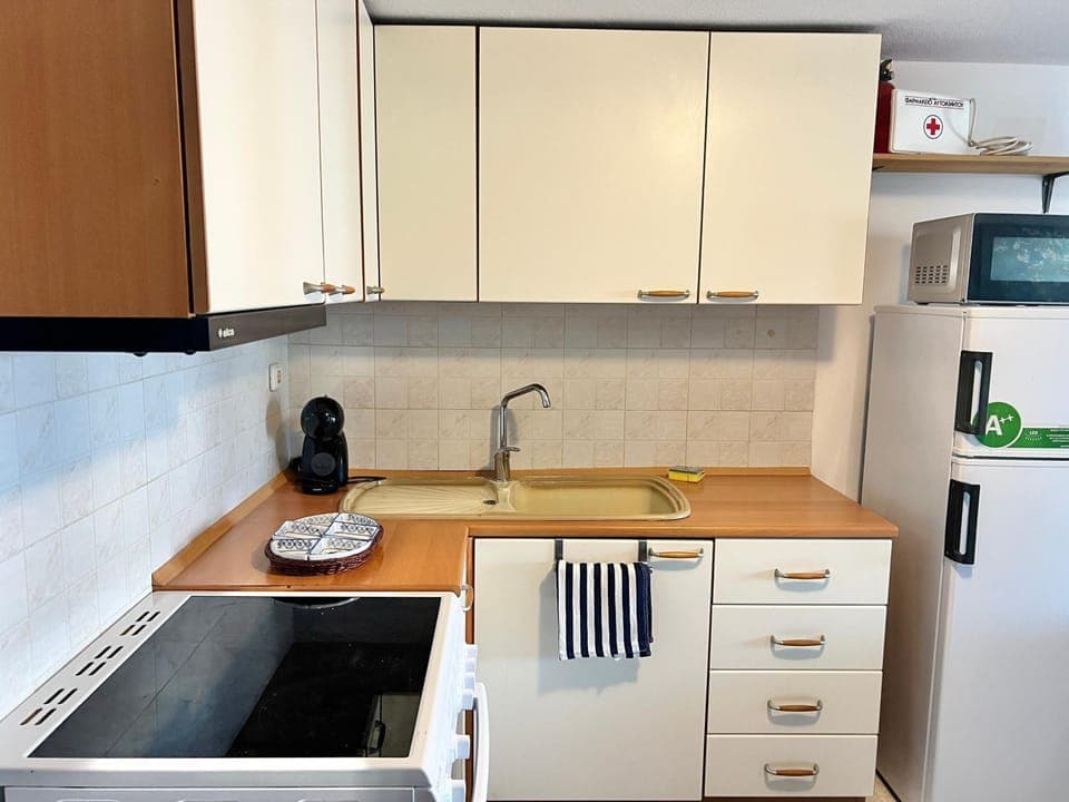 Kitchen or kitchenette, stove