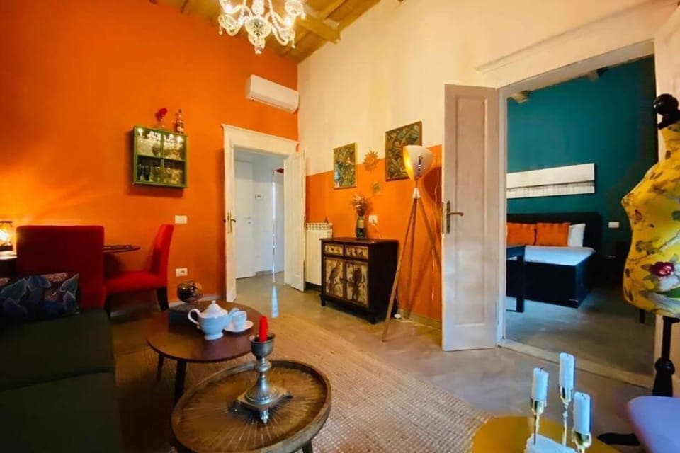 Bed, Living room, Seating area, Bedroom