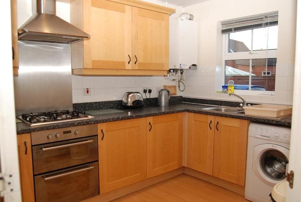 Kitchen or kitchenette, oven