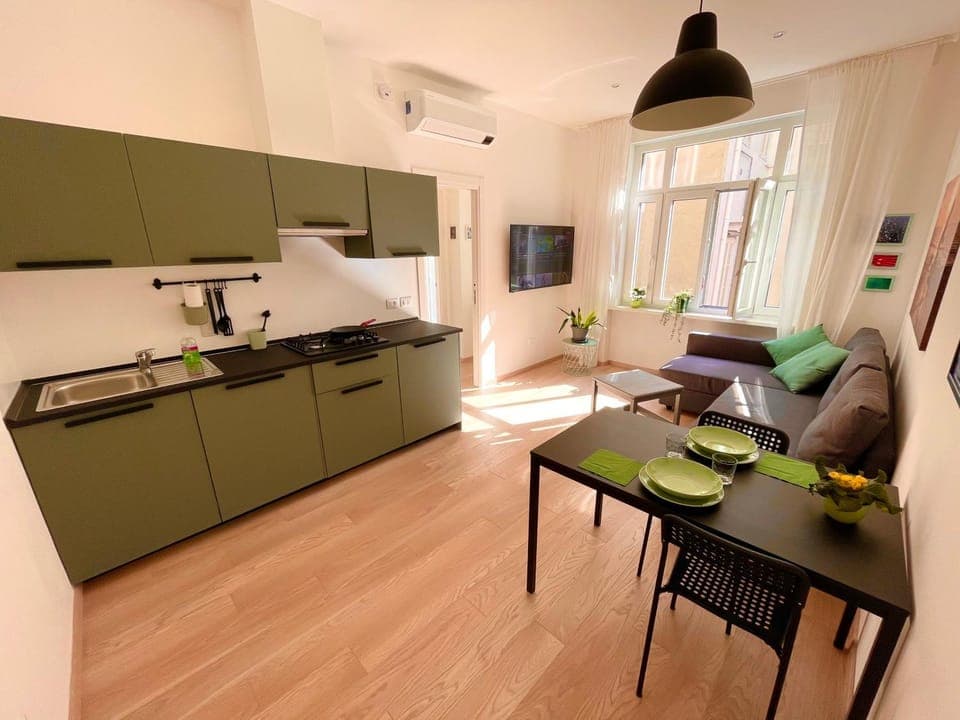 TV and multimedia, Balcony/Terrace, Kitchen or kitchenette, Living room, Seating area, Dining area, Inner courtyard view, dishwasher, microwave, stove, toaster, air conditioner