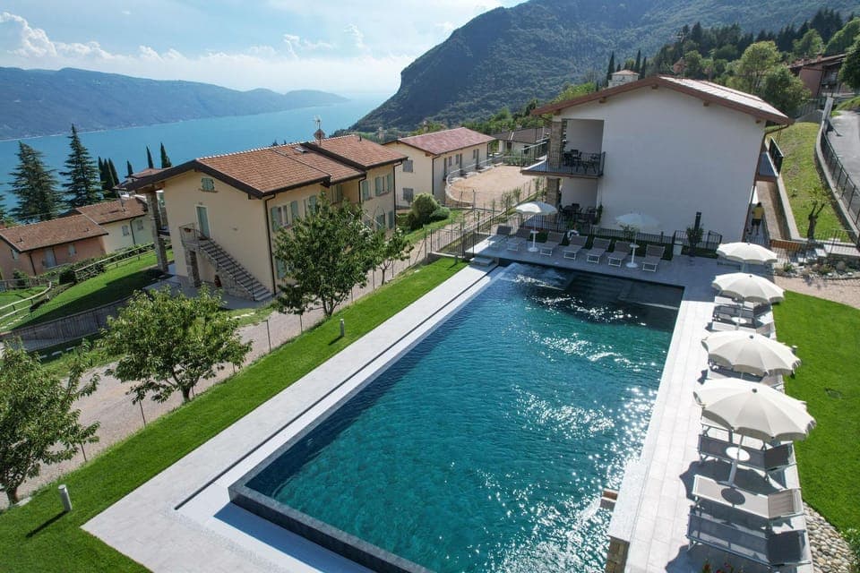 Property building, Natural landscape, Lake view, Mountain view, Pool view, Swimming pool, sunbed