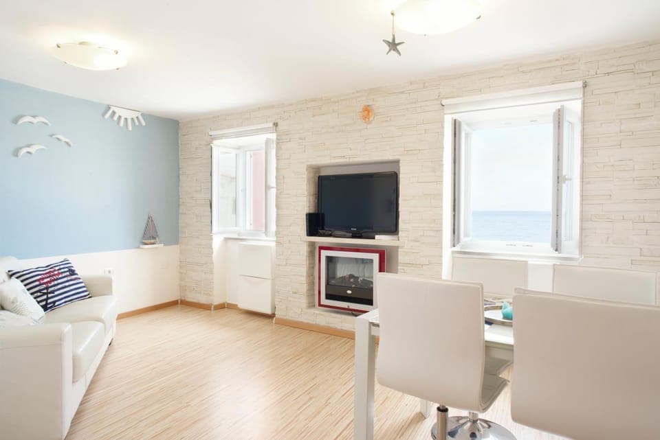 Communal lounge/ TV room, TV and multimedia, Living room, Seating area, Dining area, Sea view, Sea view, Sunset