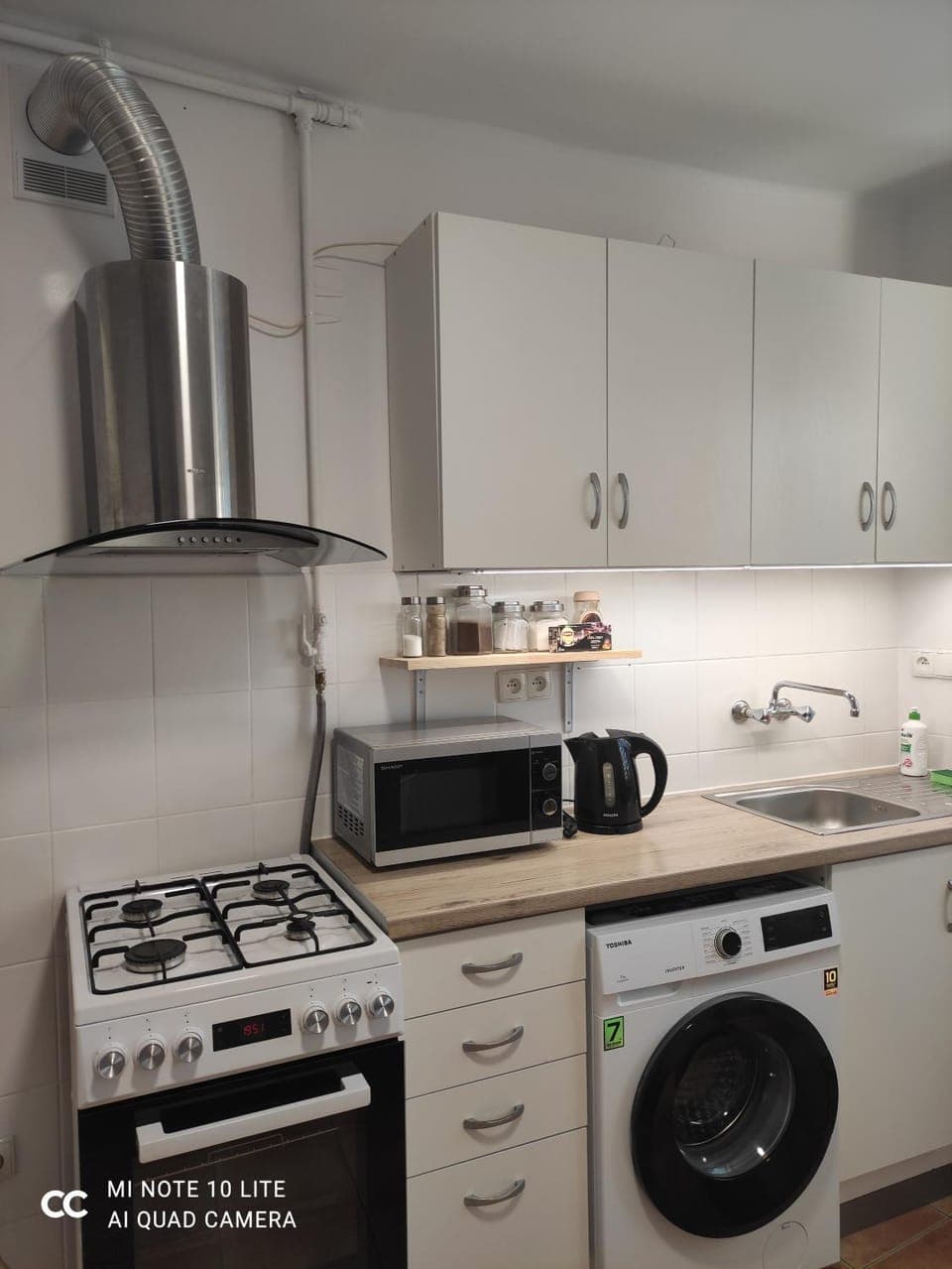 Kitchen or kitchenette, oven, pet friendly, stove, toaster, washing machine, kitchen