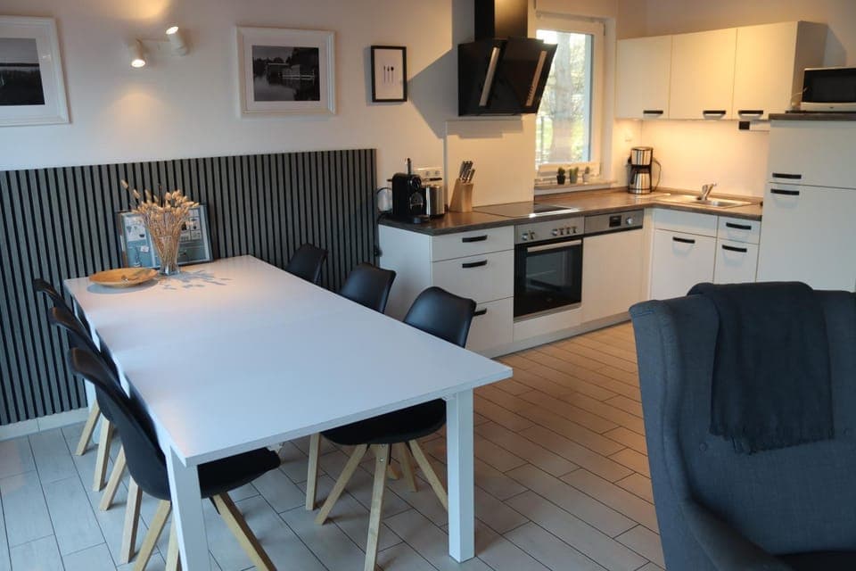 Kitchen or kitchenette, Seating area, Dining area, dishwasher, oven, stove, toaster