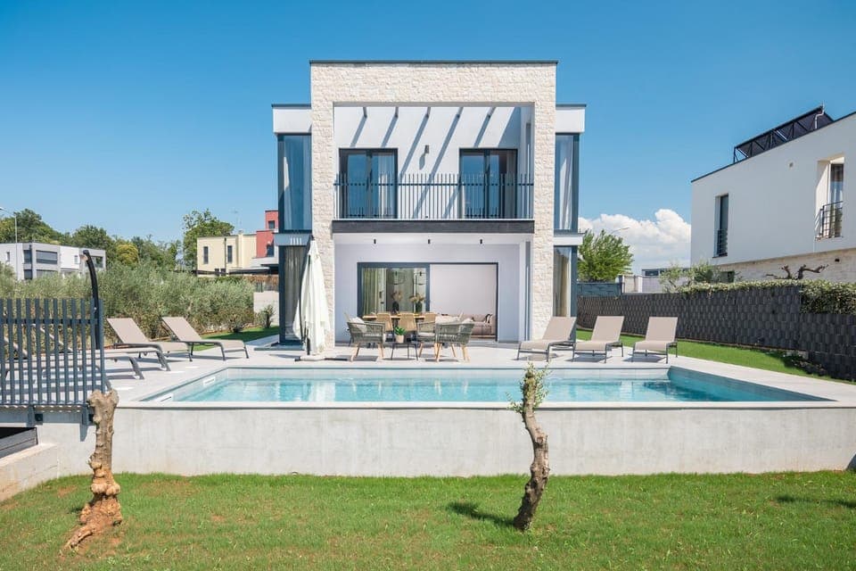 Property building, Patio, Day, Pool view, Swimming pool