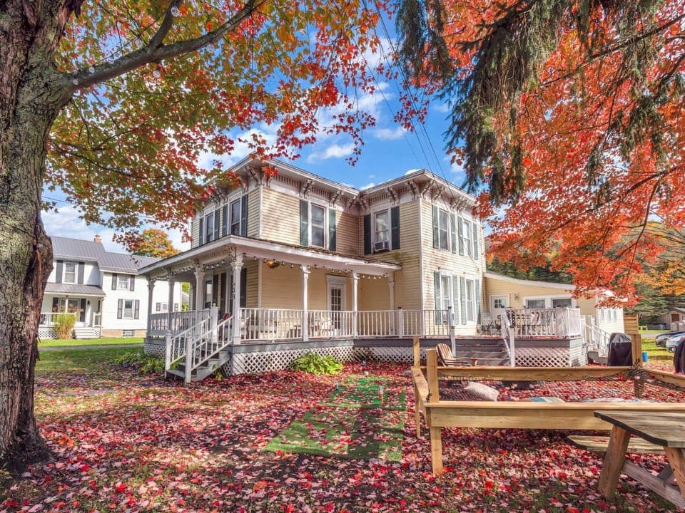 Property building, Spring, People, Property logo or sign, Activities, Bird's eye view, Game Room, Garden, View (from property/room), Garden view, Street view, children, Family, Quiet street view, fireplace, furniture, internet, kitchen