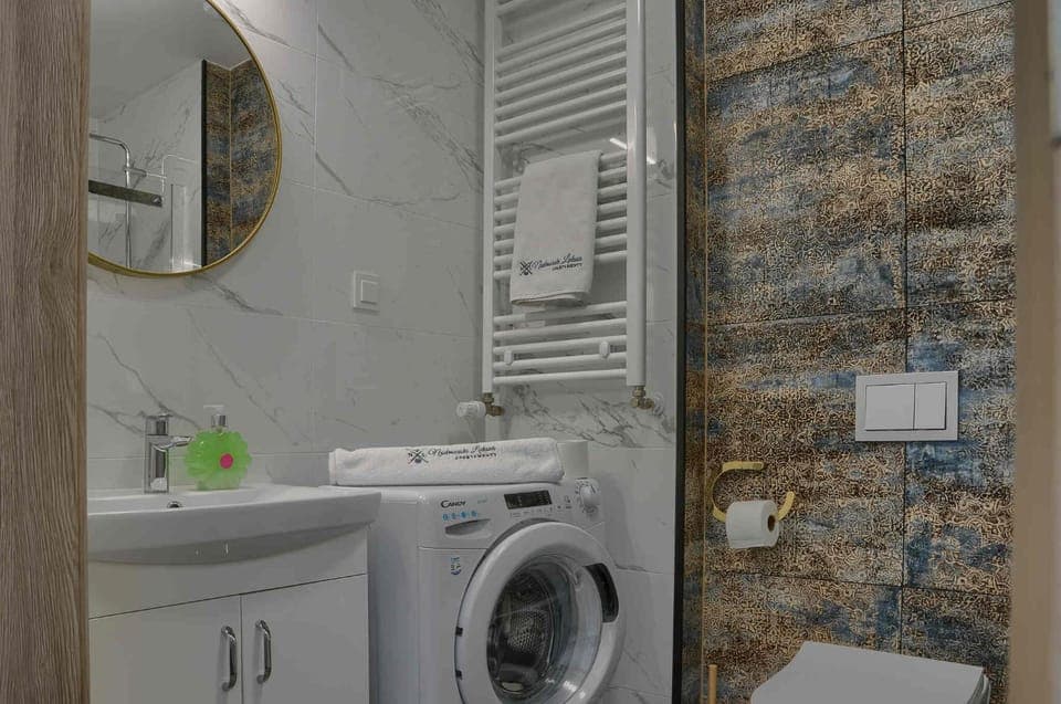 Shower, Toilet, Bathroom, towels, washing machine, dryer