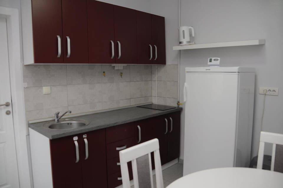 Kitchen or kitchenette, stove