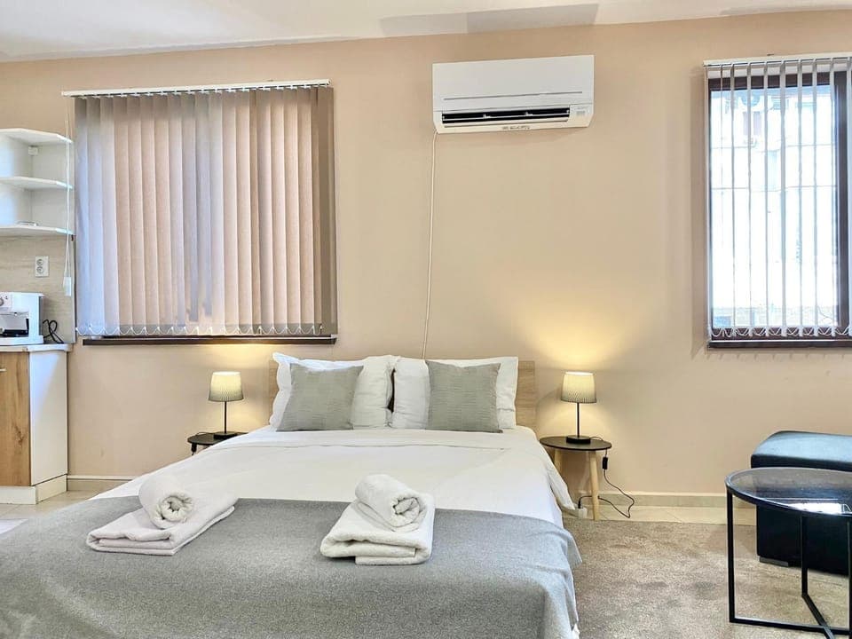 Bed, Photo of the whole room, Bedroom, towels, air conditioner