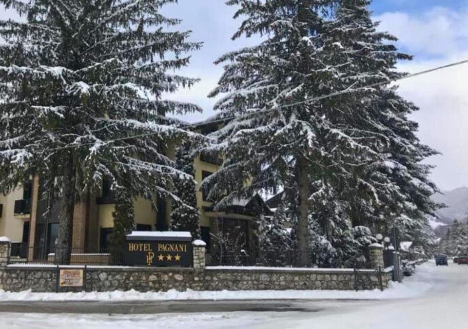 Property building, Facade/entrance, Property logo or sign, Property logo or sign, Winter, Seasons