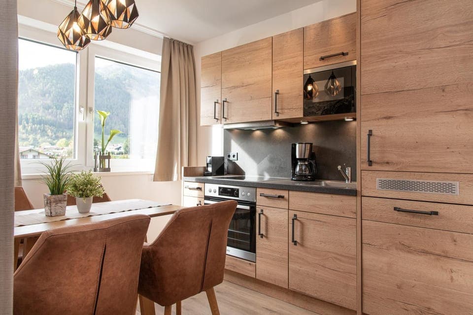 View (from property/room), Kitchen or kitchenette, Seating area, Dining area, dishwasher, minibar, stove, toaster, kitchen