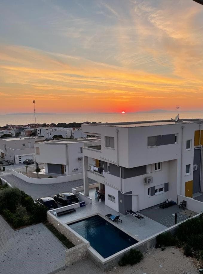 Property building, Swimming pool, Sunset