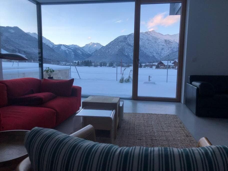 Natural landscape, Winter, Living room, Seating area, Lake view, Mountain view