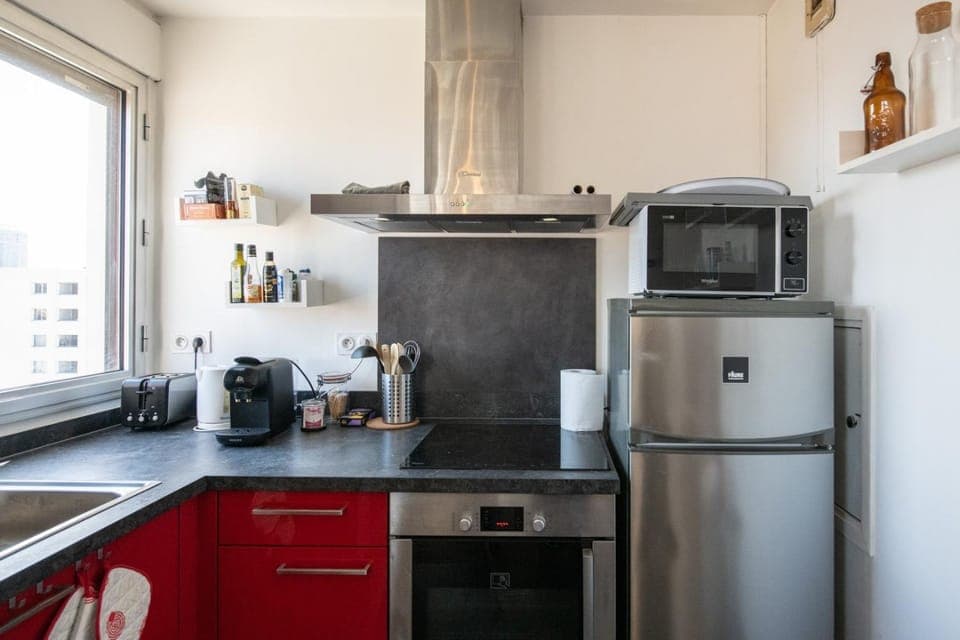 Kitchen or kitchenette, dishwasher, oven, stove, toaster