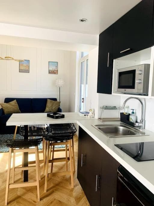 Kitchen or kitchenette, stove