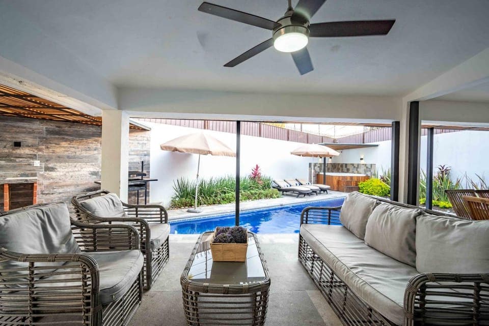 Living room, Seating area, Pool view, Swimming pool, sunbed