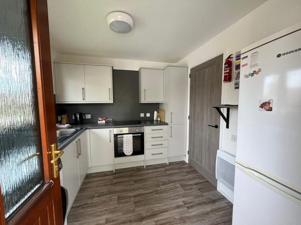 Kitchen or kitchenette, oven, stove