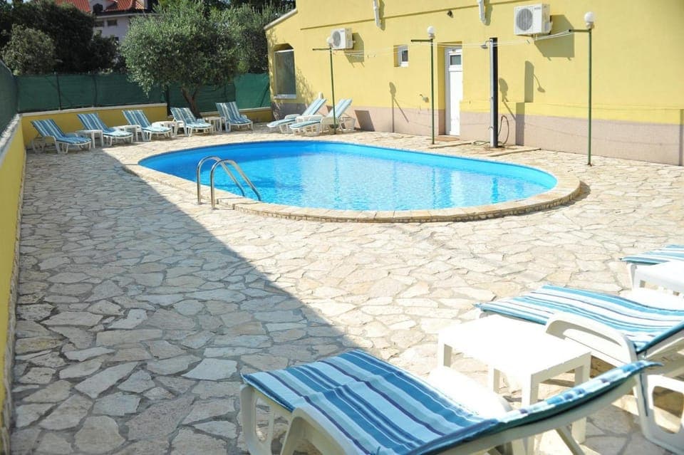 Patio, Day, Pool view, Swimming pool, Swimming pool, sunbed