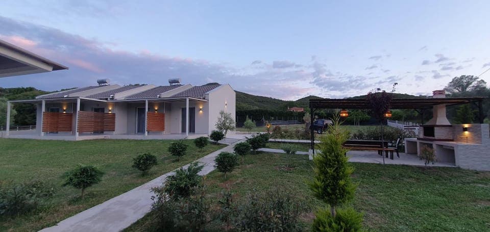 Property building, Patio, Natural landscape, Garden, Dining area