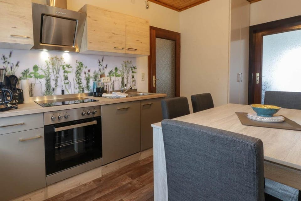 Kitchen or kitchenette, Photo of the whole room, Dining area, dishwasher, stove, kitchen