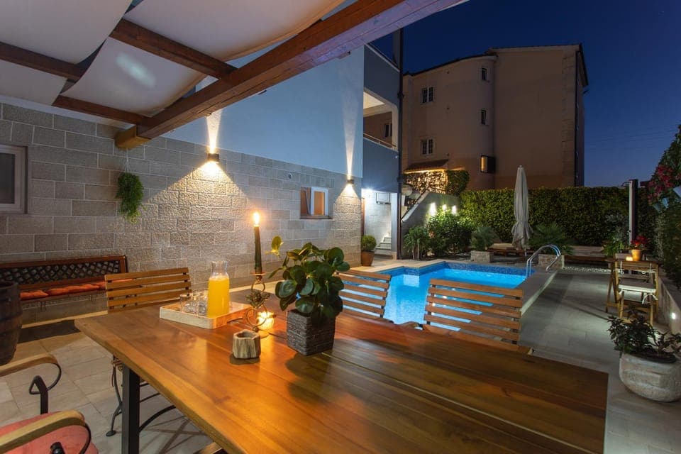 Property building, Night, View (from property/room), Pool view, Swimming pool, sunbed