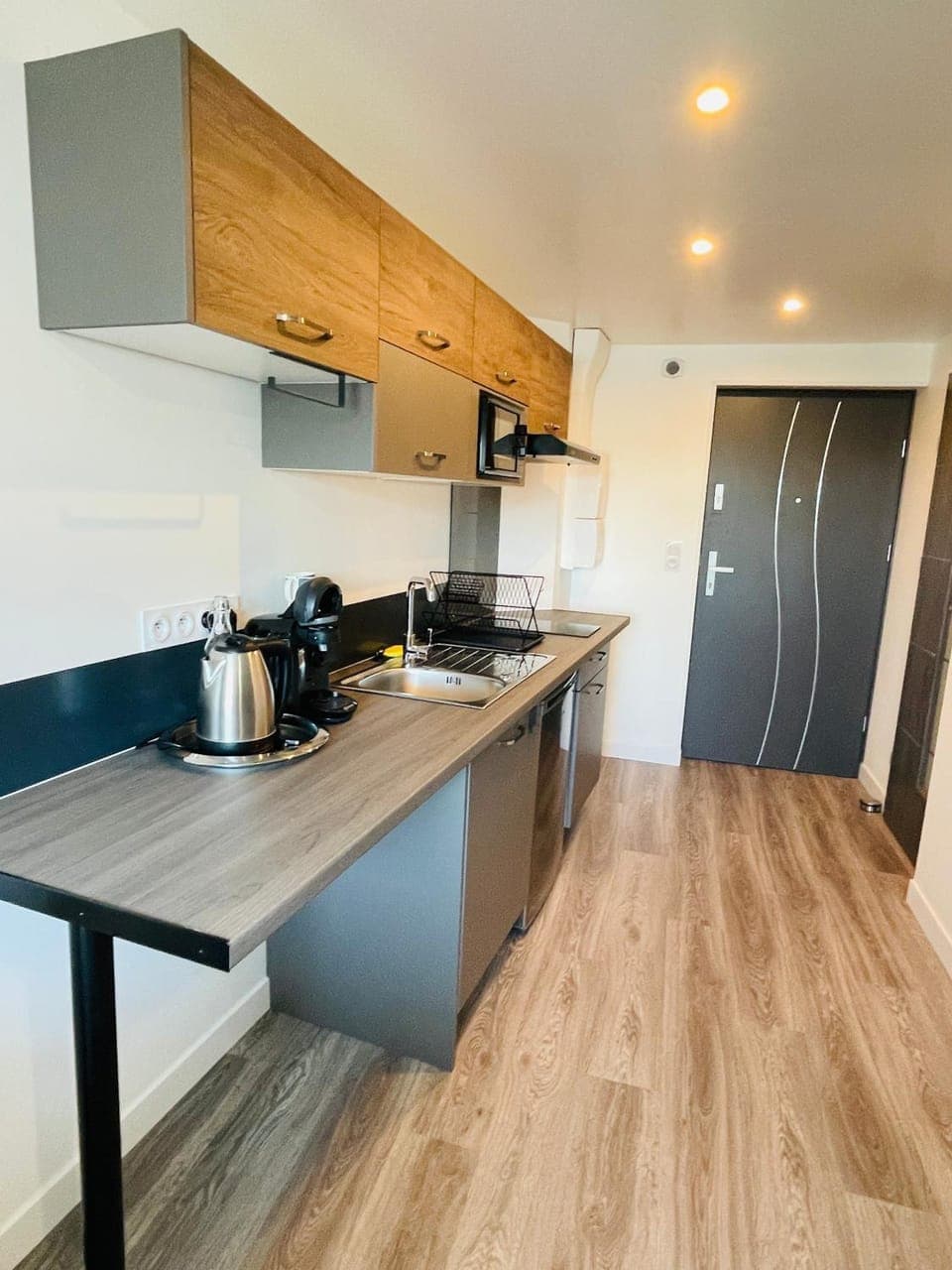 Kitchen or kitchenette, stove, kitchen