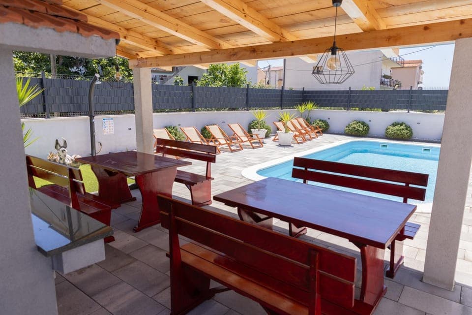 Patio, Seating area, Swimming pool, sunbed