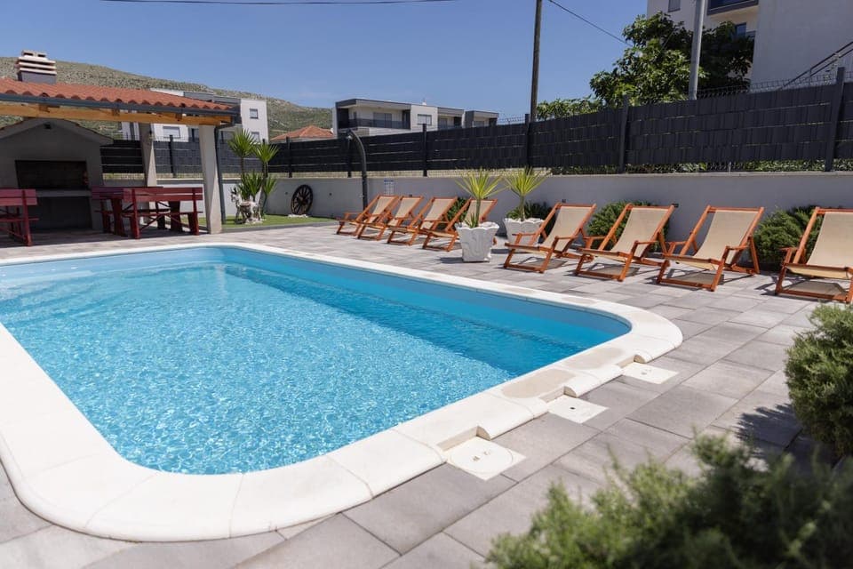 Swimming pool, sunbed