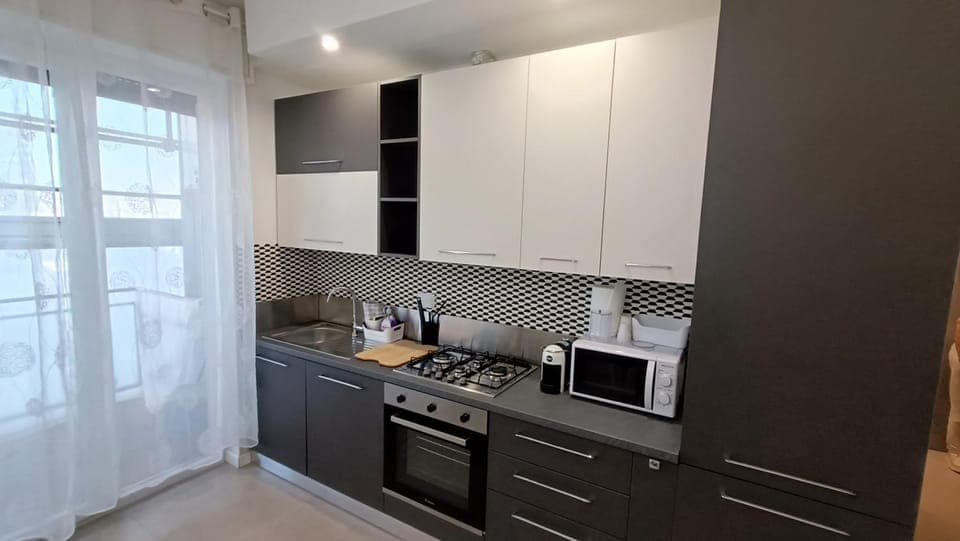 Kitchen or kitchenette, stove