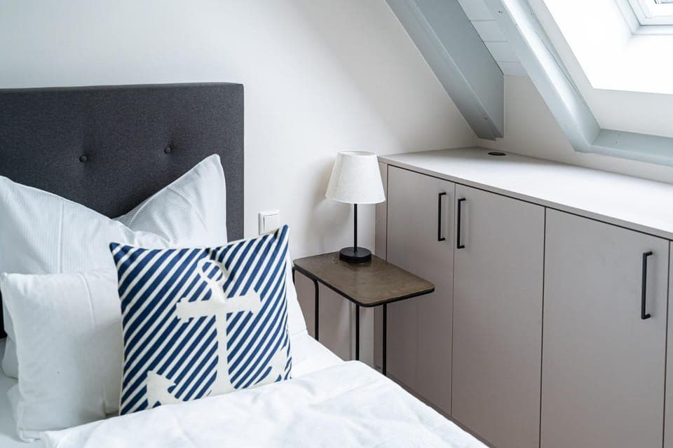 Bed, Living room, Seating area, Bedroom