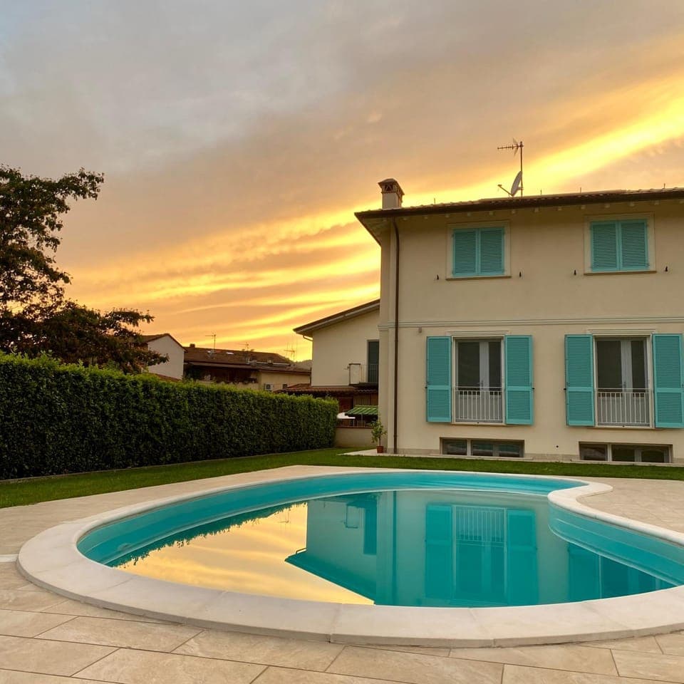 Property building, Swimming pool, Sunset