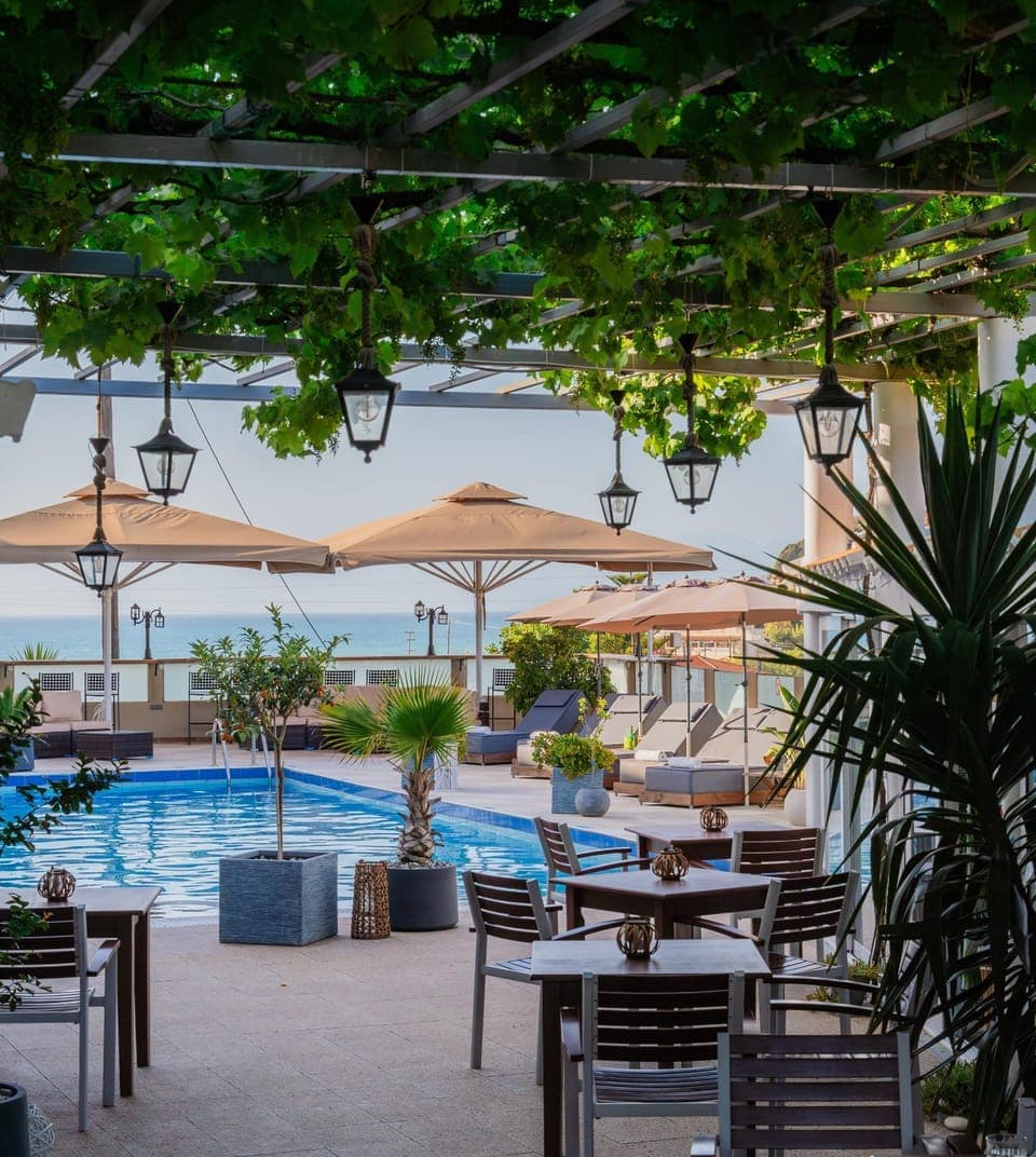 Patio, Day, Natural landscape, Pool view, Swimming pool, sunbed