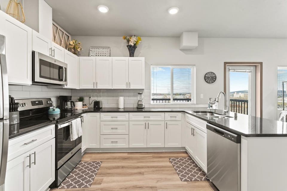 Kitchen or kitchenette, dishwasher, oven, stove, toaster