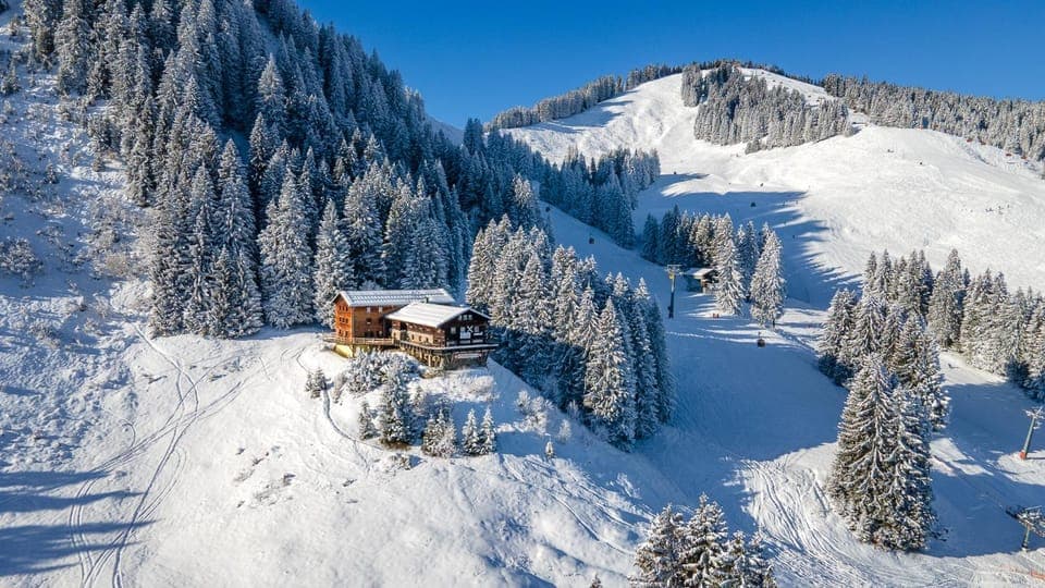 Property building, Nearby landmark, Natural landscape, Winter, Mountain view