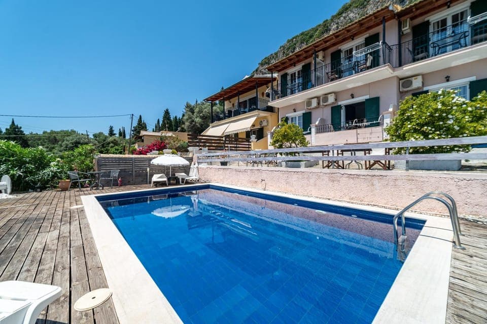 Property building, Living room, Swimming pool