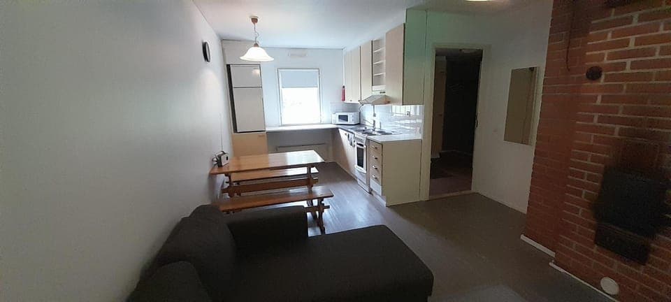 Kitchen or kitchenette, Living room, Seating area, Dining area