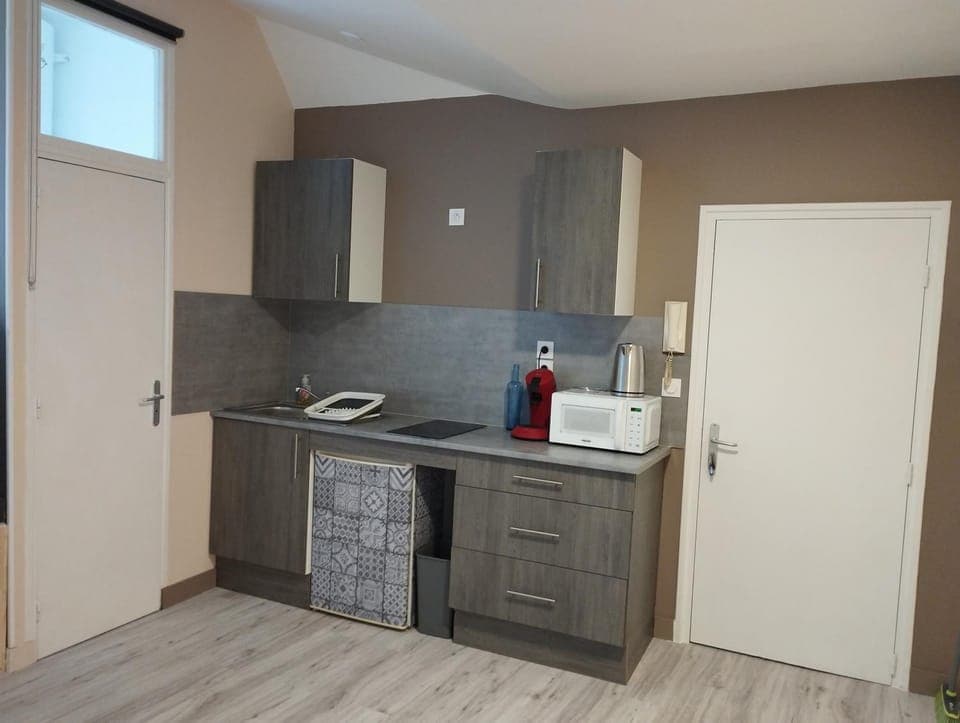 Kitchen or kitchenette, stove