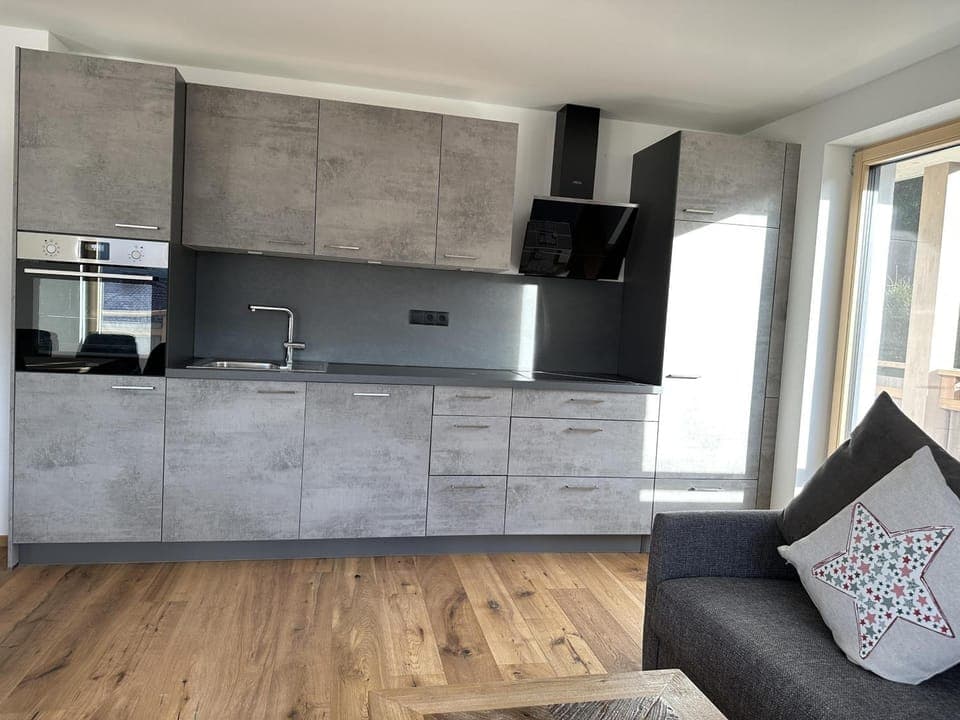 Kitchen or kitchenette, Living room, Seating area, stove