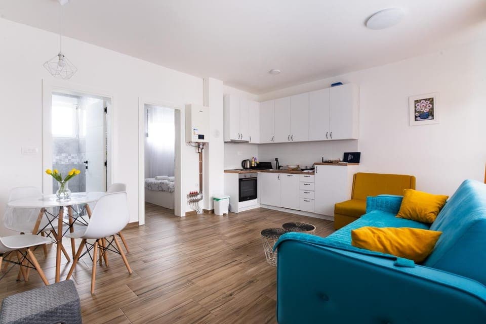 Living room, Seating area, Dining area, dishwasher, oven, stove