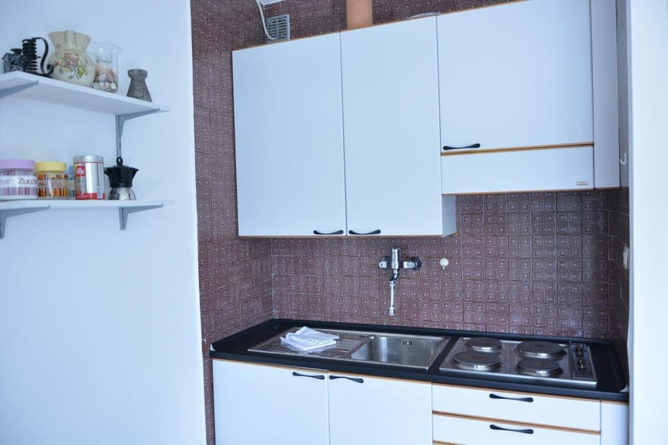 Kitchen or kitchenette, stove