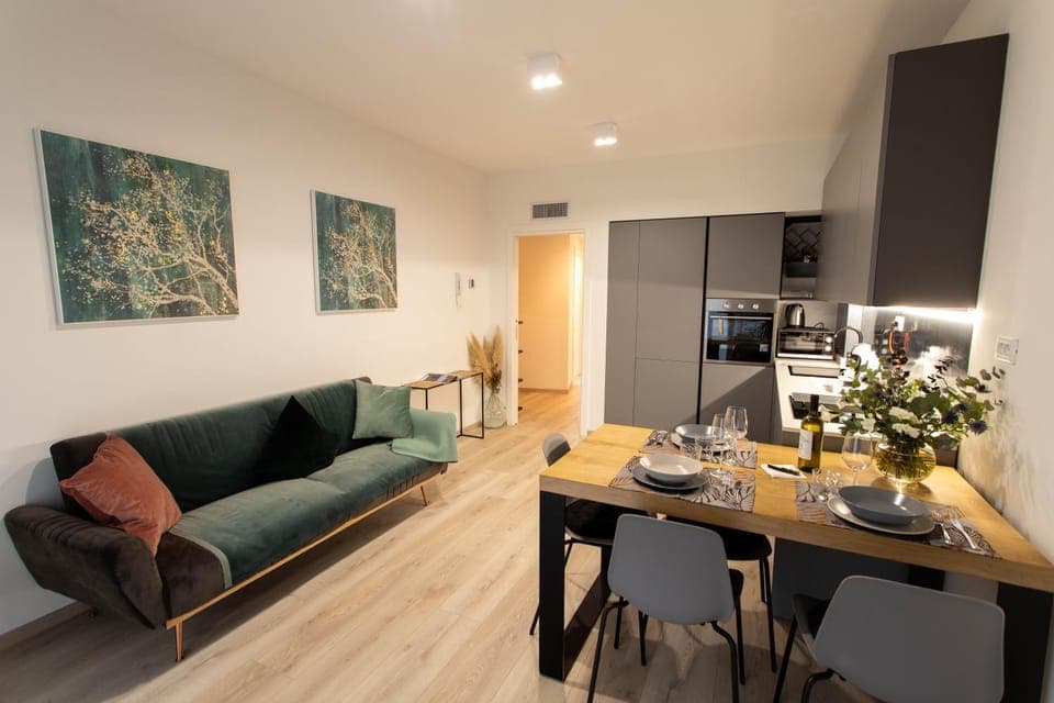 Coffee/tea facilities, Kitchen or kitchenette, Living room, Seating area, Dining area, oven, stove