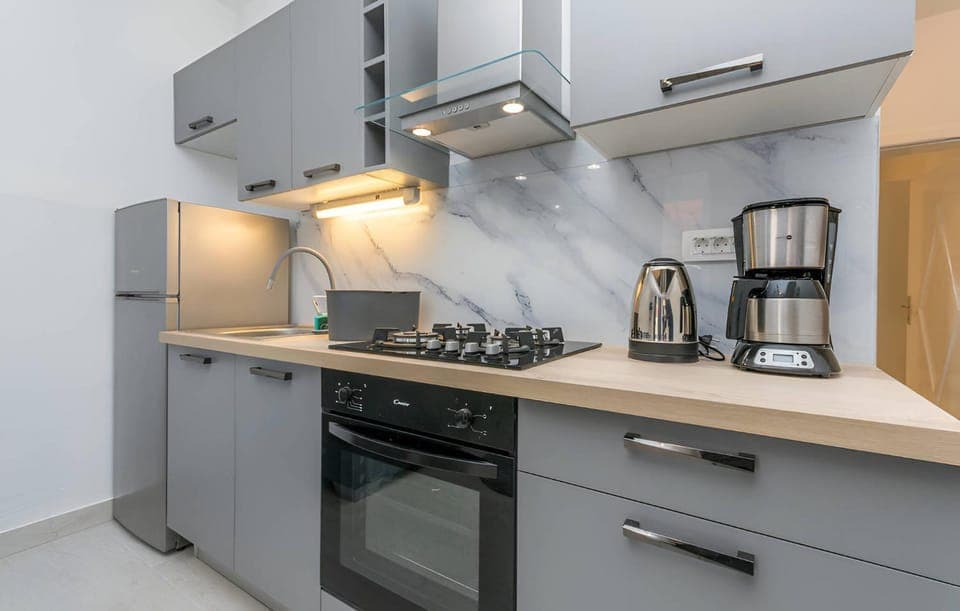Kitchen or kitchenette, oven, stove