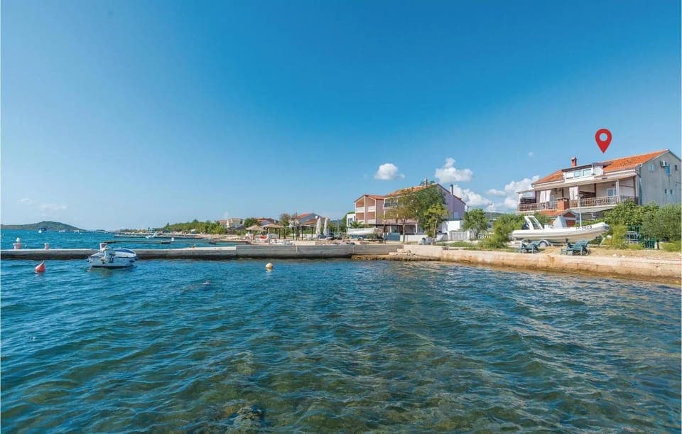 Property building, Day, Natural landscape, Beach, Sea view