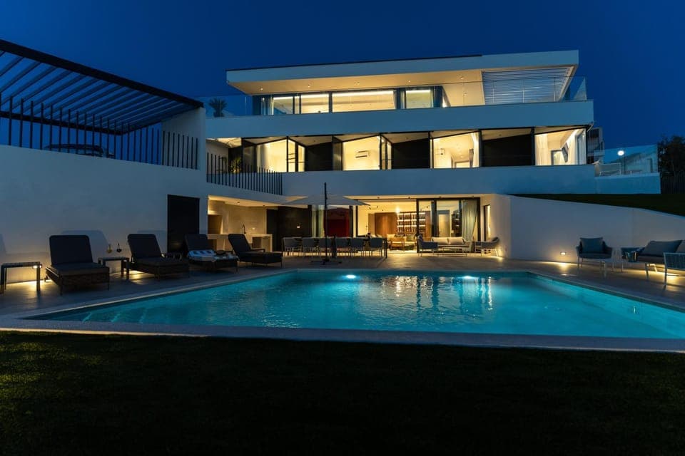 Property building, Patio, Night, Pool view, Swimming pool, sunbed