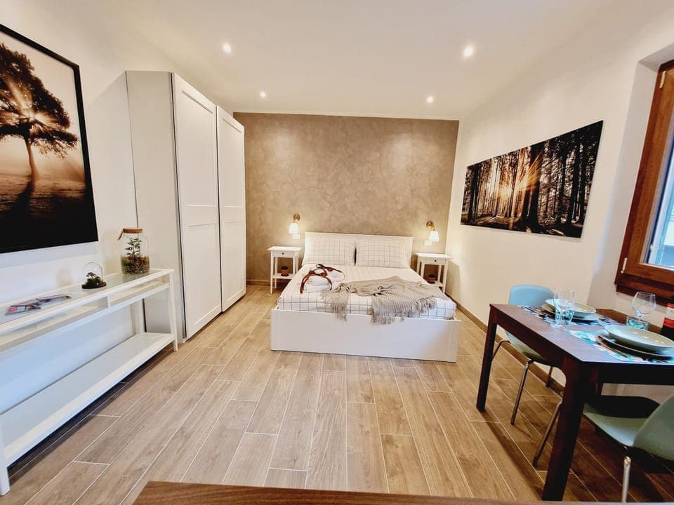 Bed, Living room, Seating area, Bedroom