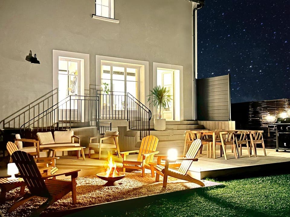 Property building, Patio, Night, View (from property/room), Balcony/Terrace, Living room, Seating area