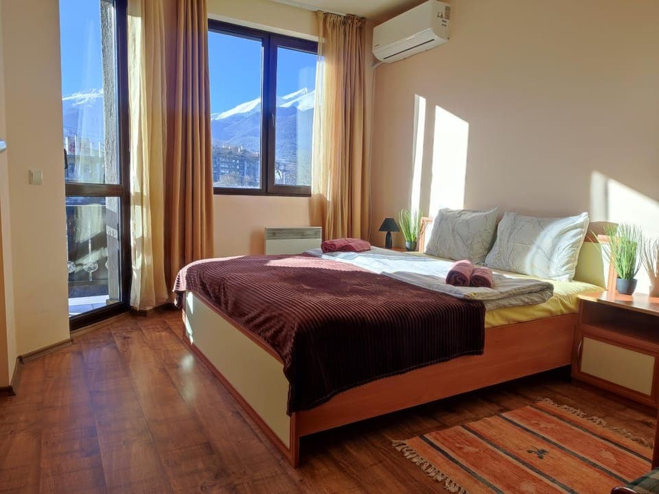 Bed, Natural landscape, Bedroom, Mountain view, towels, air conditioner