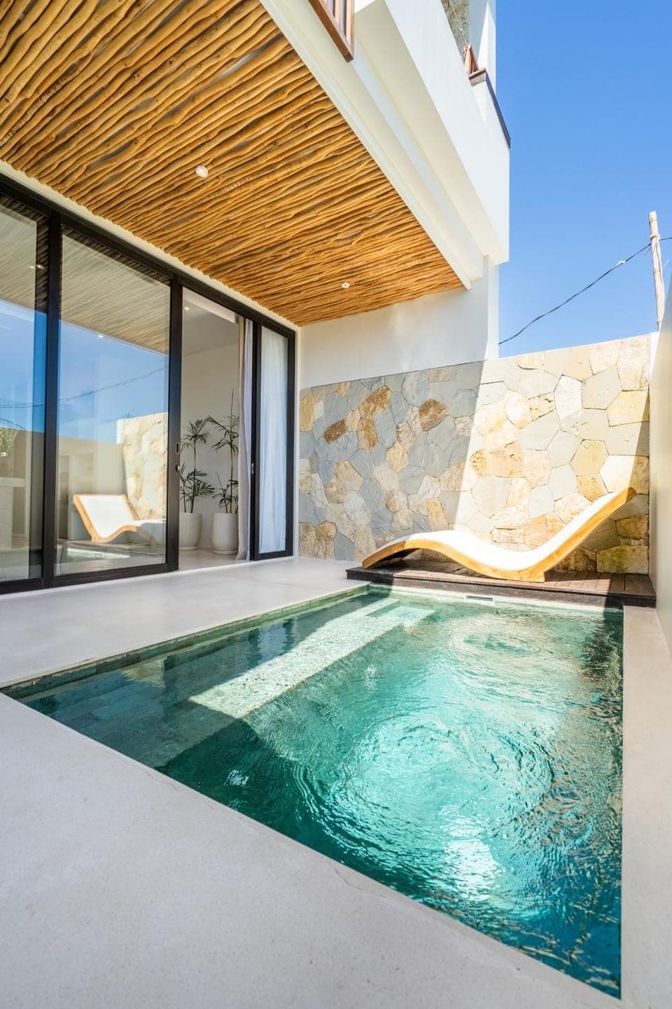 Patio, Day, Natural landscape, Pool view, Swimming pool, sunbed