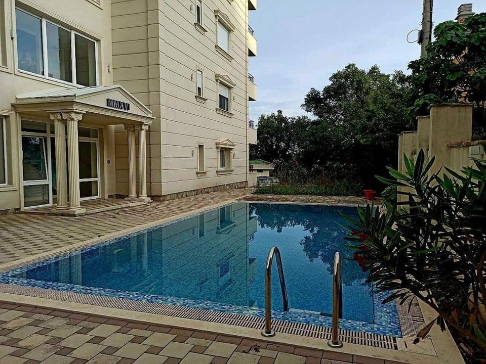 Property building, Facade/entrance, Swimming pool, Sunrise