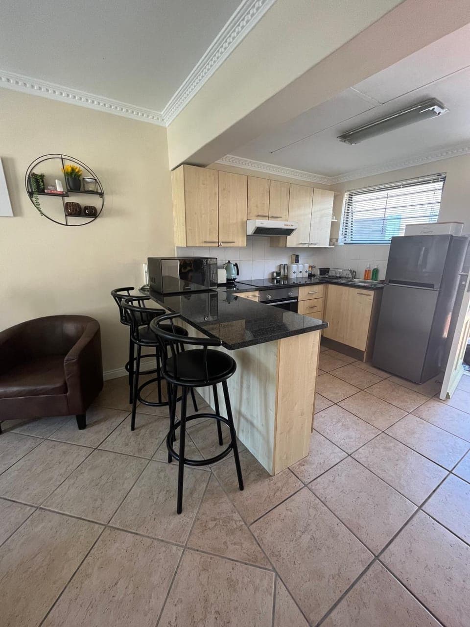 Kitchen or kitchenette, oven